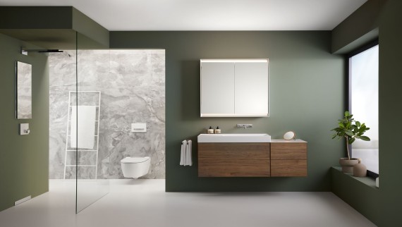 Bagno Geberit ONE con parete di separazione doccia walk-in Geberit e nicchia portaoggetti