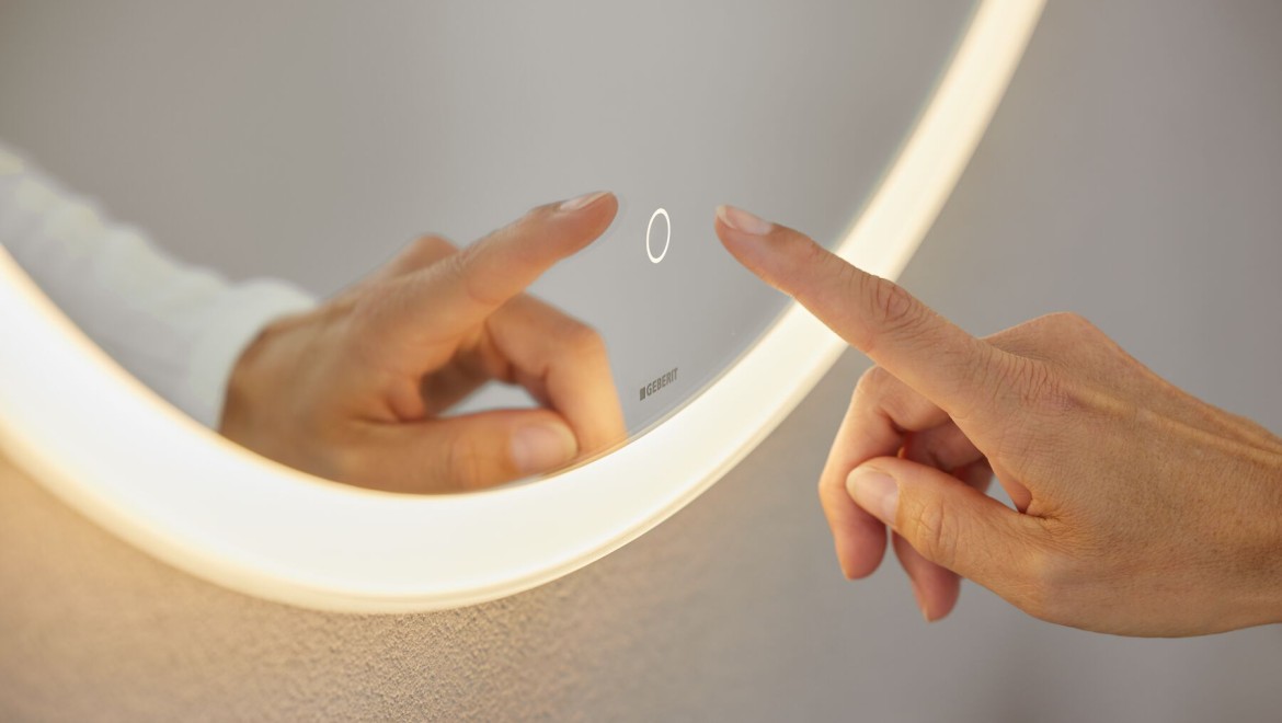 Miroir rond Option avec interrupteur sensitif (© Geberit)