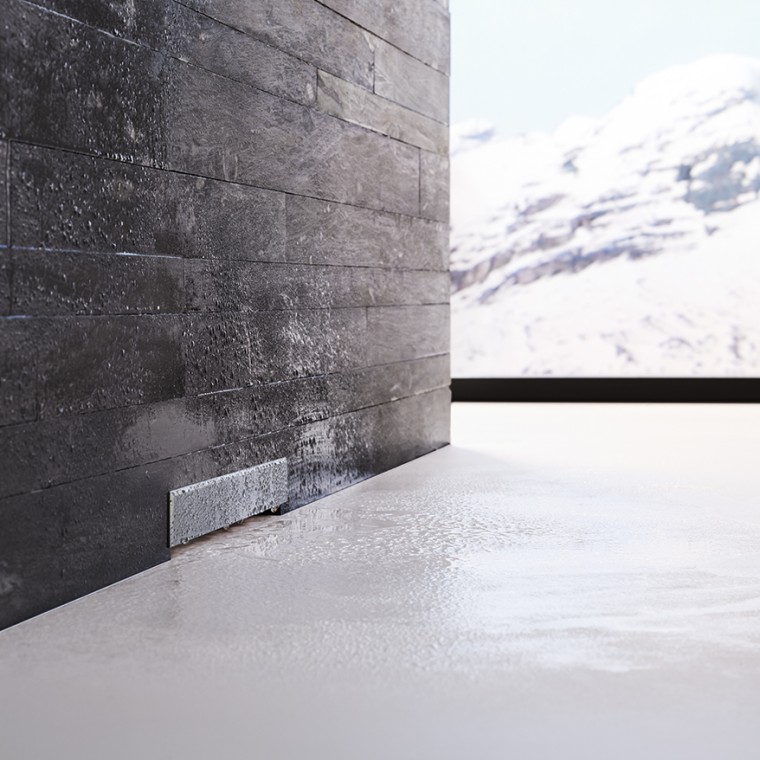 Geberit Wandablauf in schwarz gemauerter Wand Geberit Wandablauf in schwarz gemauerter Wand