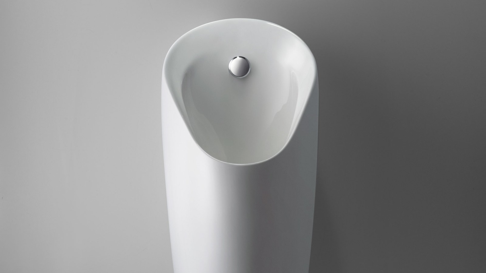 L'orinatoio Geberit Preda, sottile e compatto, con comando di risciacquo integrato L'orinatoio Geberit Preda, sottile e compatto, con comando di risciacquo integrato