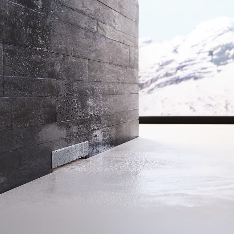 Geberit Wandablauf in schwarz gemauerter Wand Geberit Wandablauf in schwarz gemauerter Wand